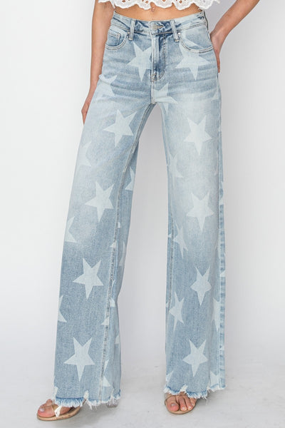 The Raw Hem Star Wide Leg Jeans are a fashionable and eye-catching choice for those looking to make a statement with their outfit. The raw hem detail gives these jeans a casual and edgy vibe, while the star embellishments add a touch of whimsical charm