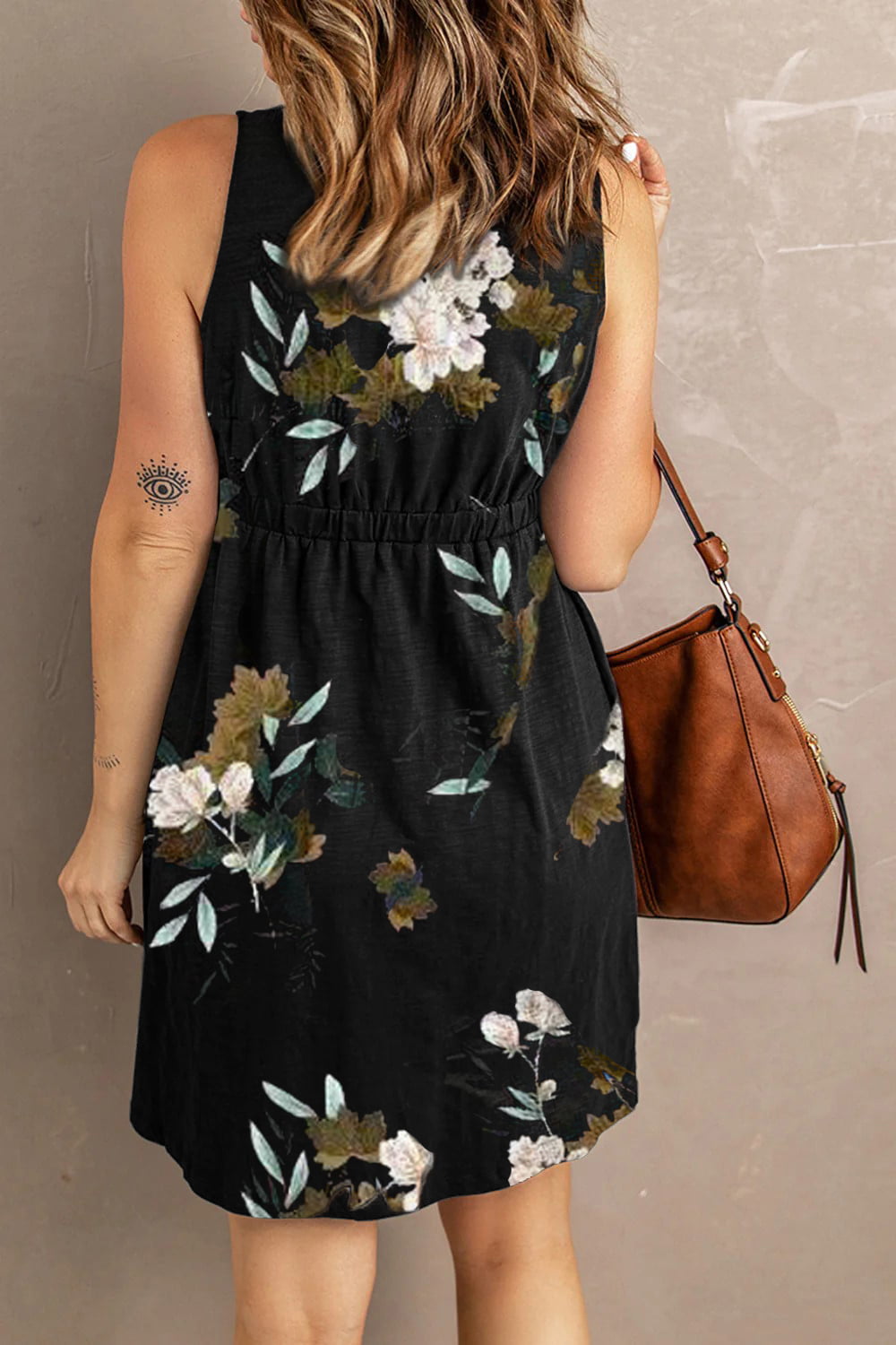 Experience the magic of fashion with our Crazy Thing Called Love dress. Featuring a unique scoop neck, sleeveless design, and convenient button closure, this dress is both stylish and functional