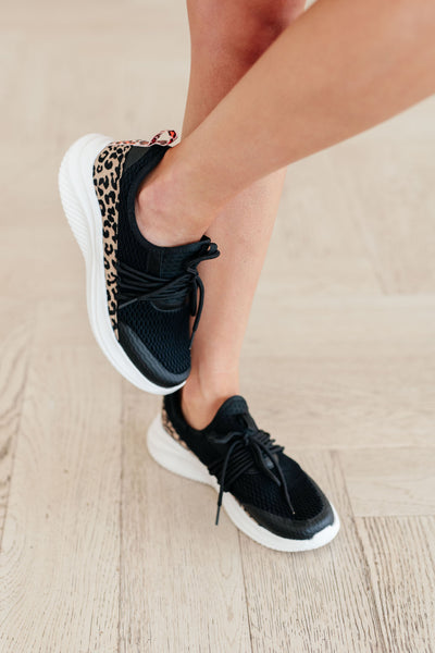 Step into style and comfort with Easy to Spot Sneakers! Featuring a soft memory foam sole and a fierce leopard accent, these kicks will have you strutting with confidence