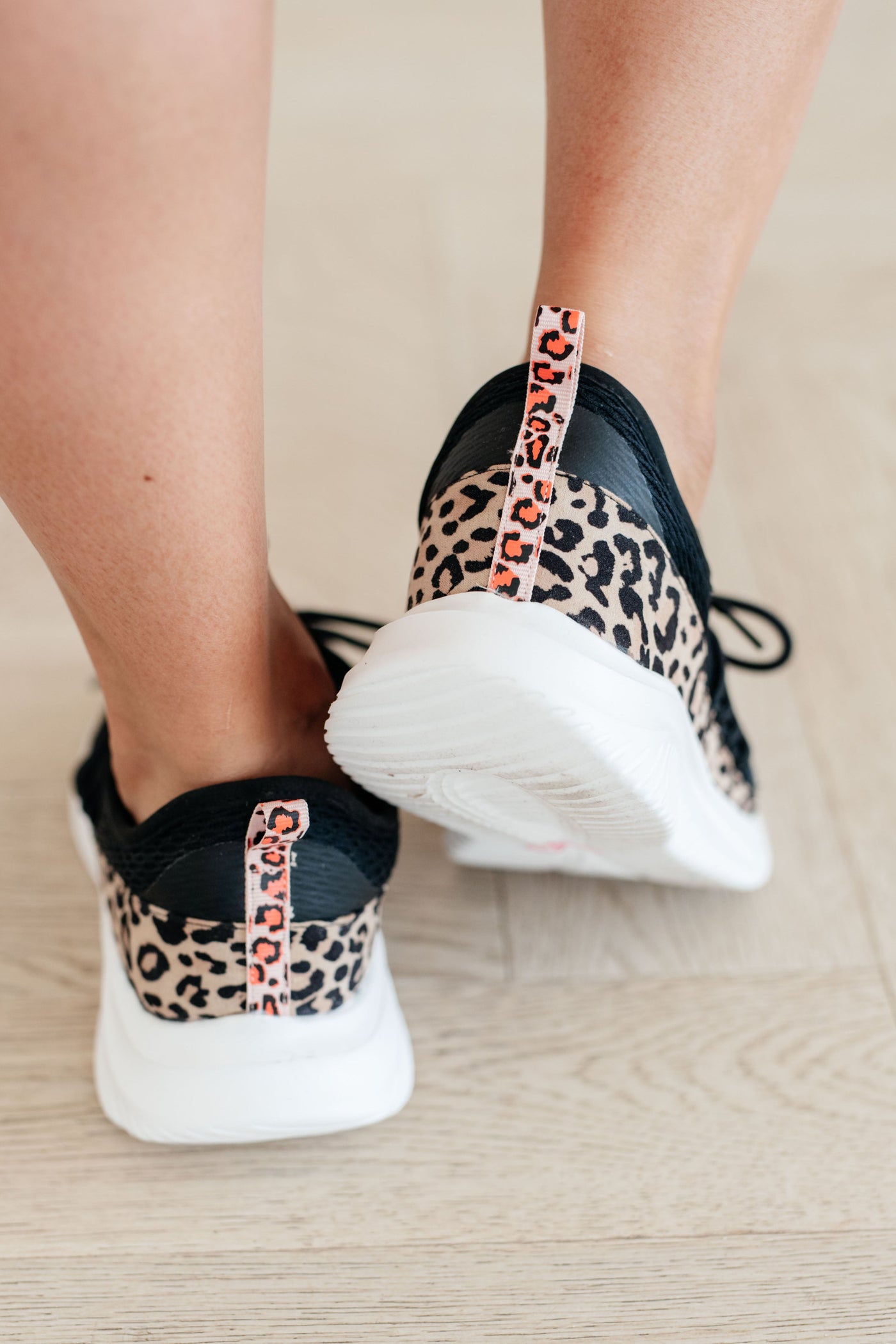 Step into style and comfort with Easy to Spot Sneakers! Featuring a soft memory foam sole and a fierce leopard accent, these kicks will have you strutting with confidence