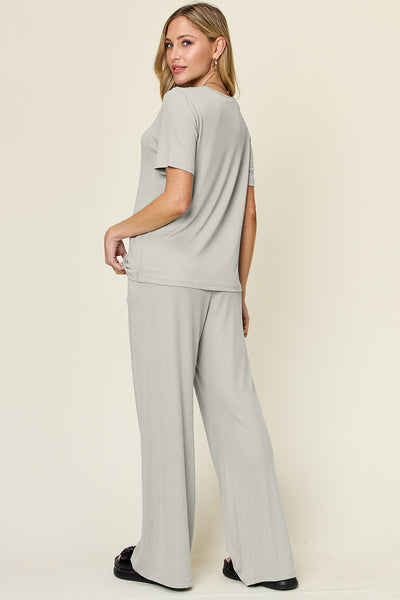 Expertly crafted, this set combines a classic round neck short sleeve t-shirt with stylish wide leg pants