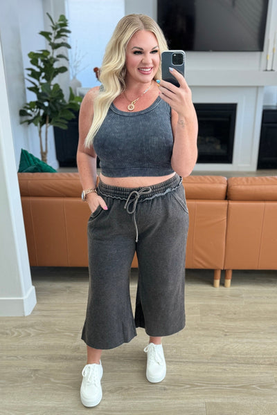 Get ready to rock and roll in these Acid Wash Wide Leg Sweatpants! Made with mineral wash fleece, these sweatpants feature raw edge details and a functional drawstring for that perfect fit.