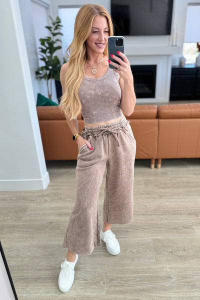 Get ready to rock and roll in these Acid Wash Wide Leg Sweatpants! Made with mineral wash fleece, these sweatpants feature raw edge details and a functional drawstring for that perfect fit.