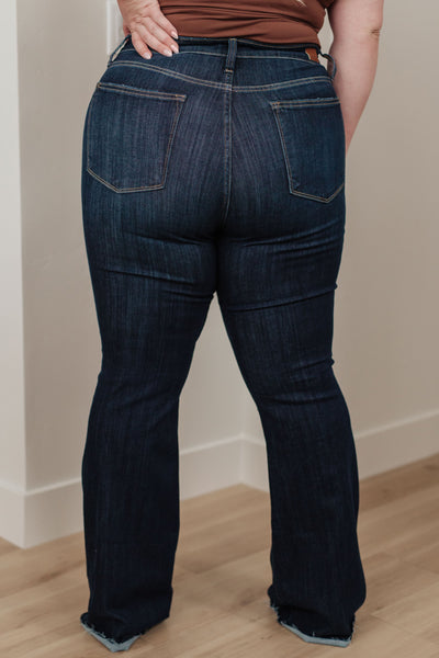 Our Jane High Rise Raw Hem Flare Jeans from Judy Blue are the perfect piece for any wardrobe.