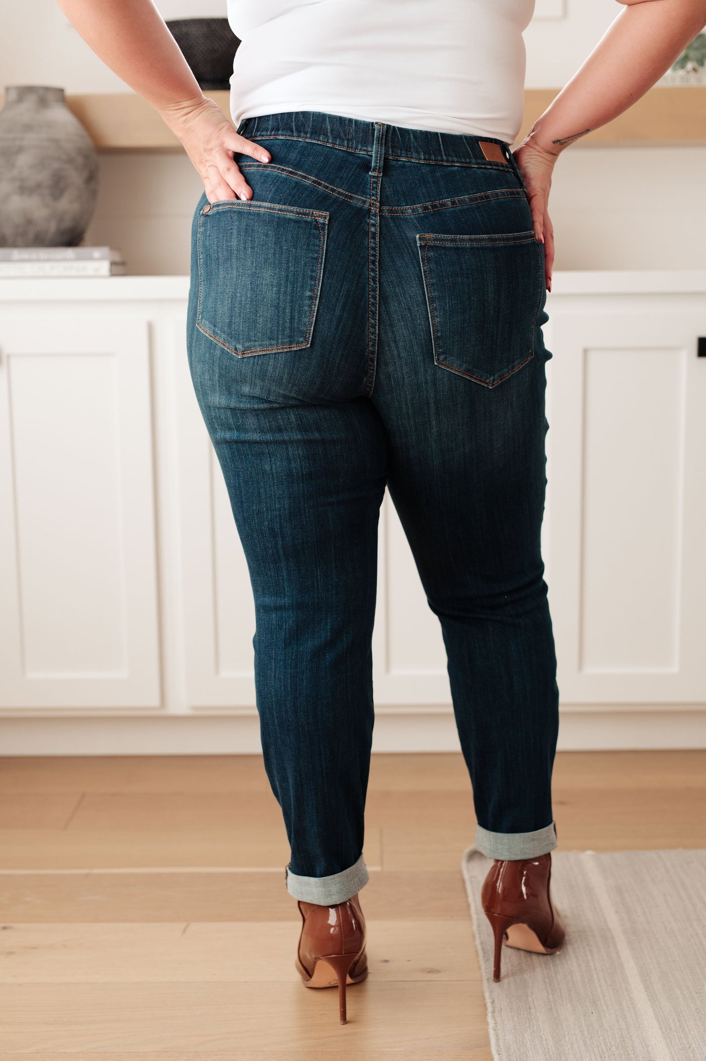 The Rowena High Rise Pull On Double Cuff Slim Jeans From Judy Blue provide sleek and slimming fit with faux front pockets and an optional rolled cuff.