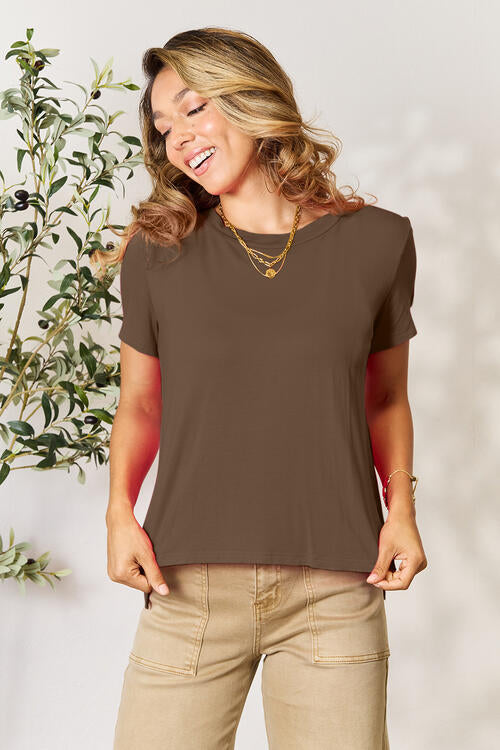 The Sapphire Basic Round Neck Short Sleeve T-Shirt offers a relaxed fit with its lightweight cotton construction