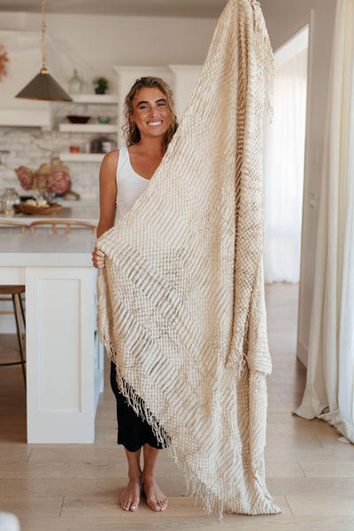 Step into a world of luxury with the Graham Throw by Cuddle Culture in Beige