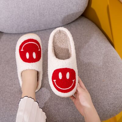 Introducing the adorable Smiley Face Cozy Slippers! These cozy and plush slippers are designed to bring a smile to your face every time you put them on