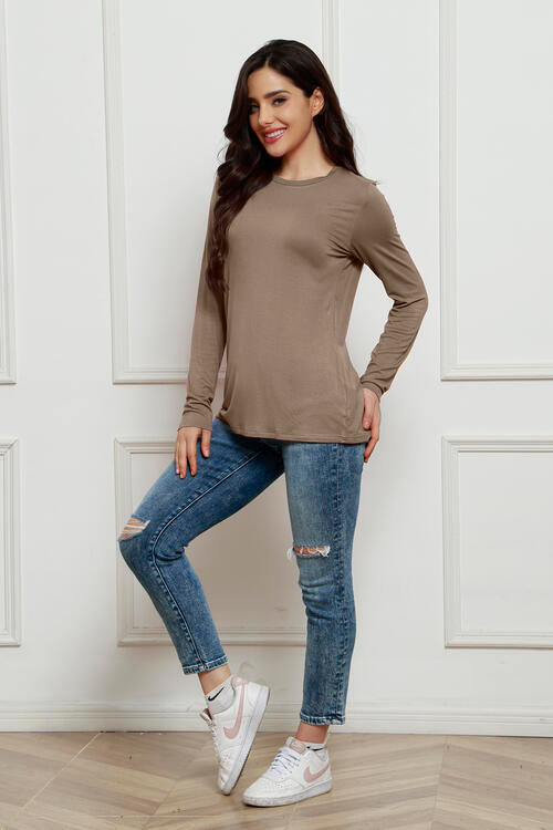 Our Basic Bae Full Size Round Neck Long Sleeve Top is crafted from a premium quality material that offers perfect stretch and breathability.