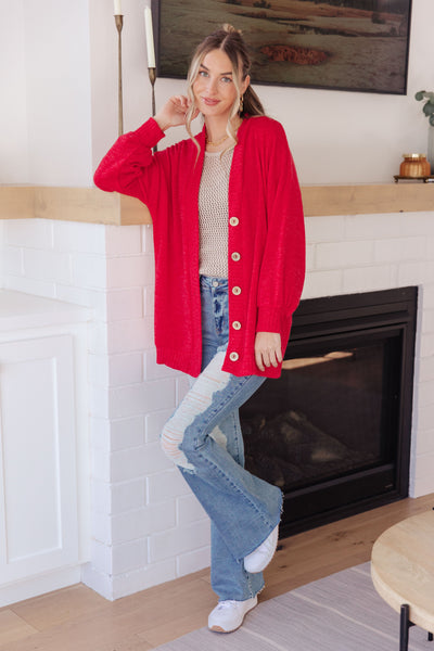 This Be My Neighbor Cardigan is a must-have for any wardrobe. Crafted from sweater knit, it has wood buttons and ribbed trim for a classic look