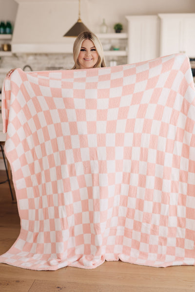 Cozy up with Penny! This shareable sized blanket offers the ultimate Cuddle Culture experience, with a trendy checkered print and the softest cloud-like plush fabric you've ever felt