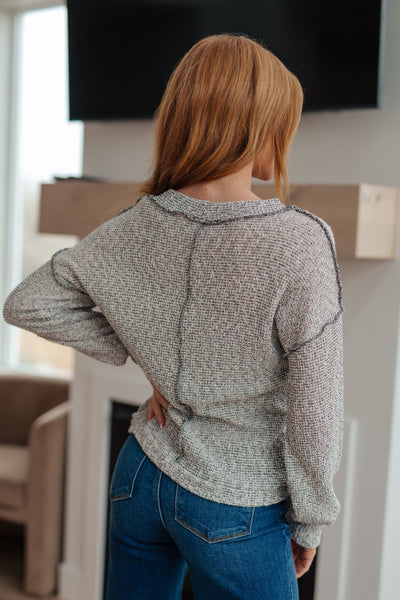 This chic and cozy Both Sides of the Story Pullover features a waffle knit, exposed seams, slim fit, and dropped shoulders for an ultra-comfortable fit