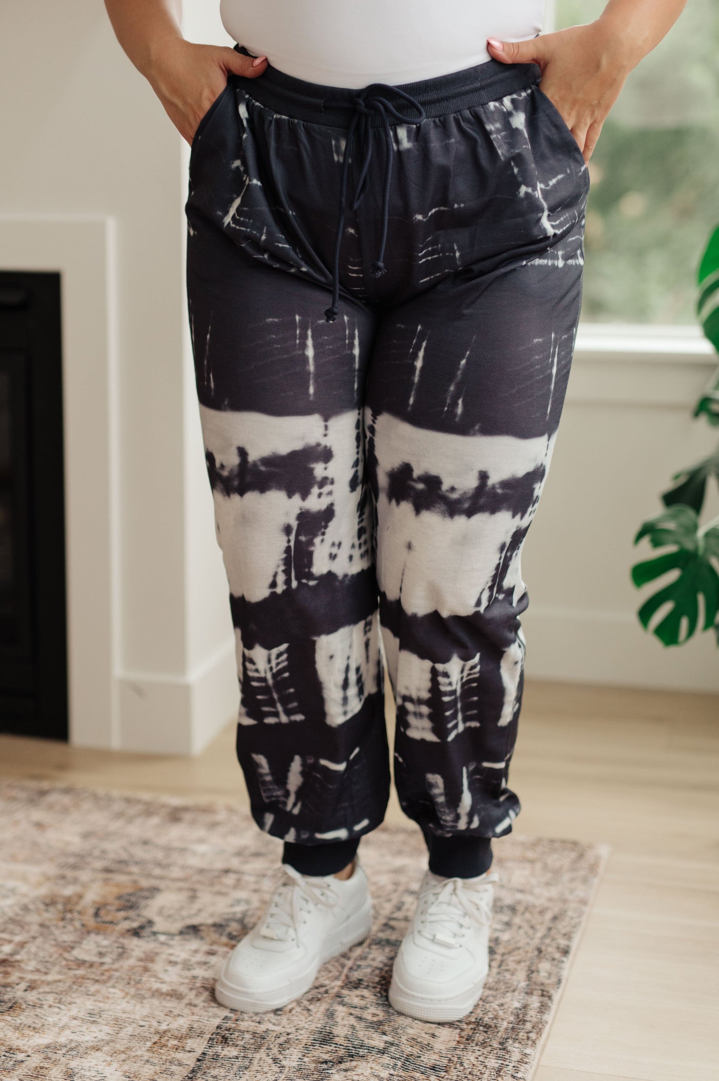 With a tie dye pattern, jogger silhouette and elastic waistband with drawstring, you’ll be on trend and comfortable all day.