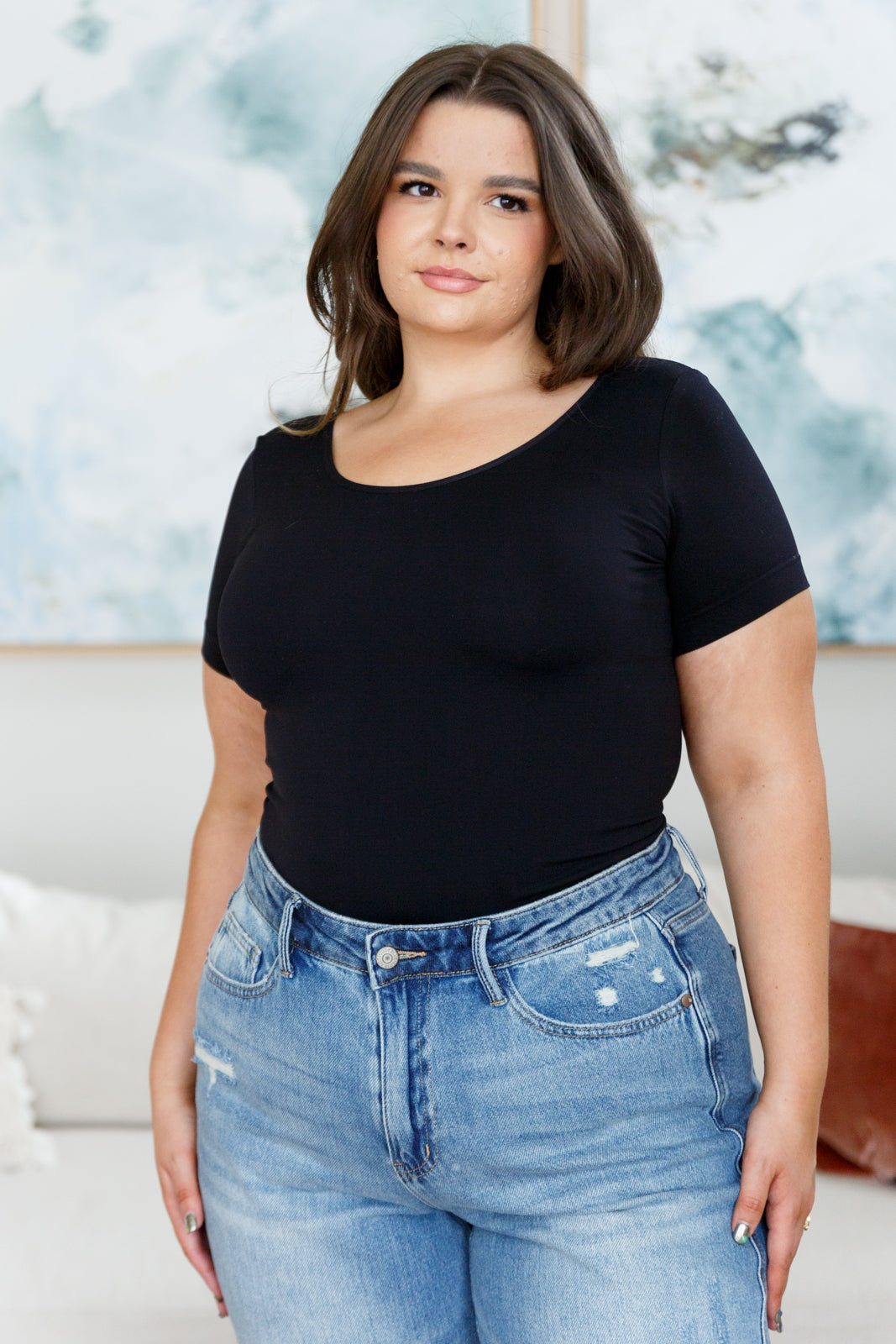 The Everyday Scoop Neck Short Sleeve Top is the perfect sleek and fitted base for any look