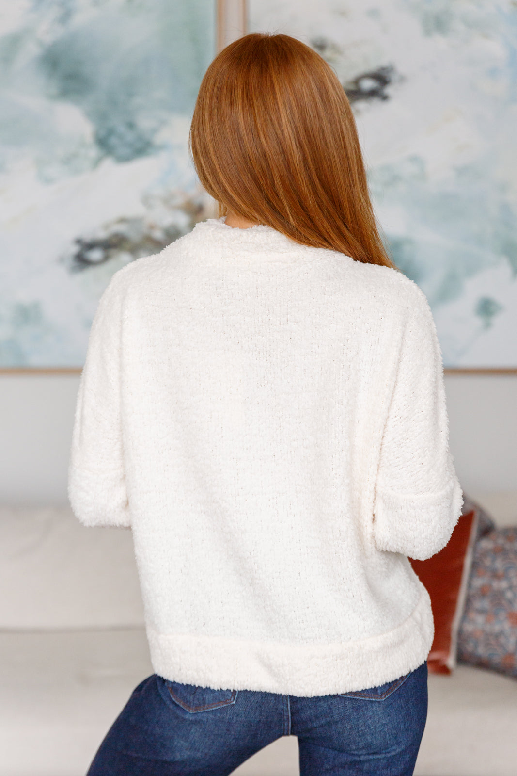 Curl up in style with this cozy Expecting Snow Mock Neck Boucle Sweater