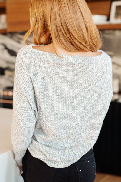 Made with lightweight knit, this top offers both comfort and style