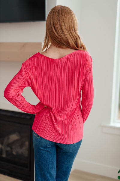 In a bright, fun color, this top brings the perfect balance of chic and comfort to your wardrobe.