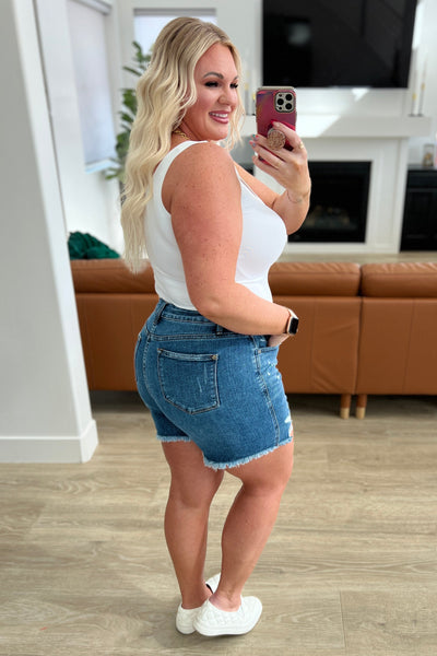 Get ready to rock&nbsp;your&nbsp;warm weather&nbsp;wardrobe with our Samantha High Rise Rigid Magic Distressed Cutoff Shorts from Judy Blue