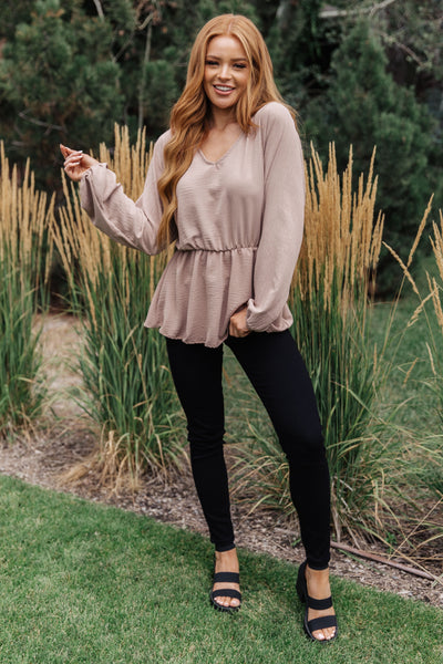 Look incredible and feel even better in the Imagine It All V-Neck Peplum Top