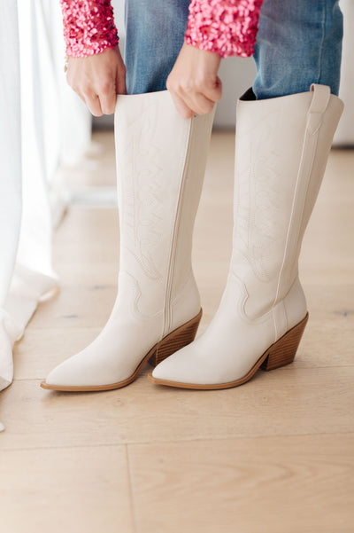 With embroidered stitching, a snipped almond toe, and a stacked heel, these boots have a wide calf fit, offering all-day comfort and stylish good looks. Step out in confidence with these beautiful boots today