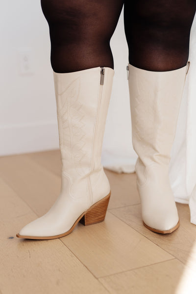 With embroidered stitching, a snipped almond toe, and a stacked heel, these boots have a wide calf fit, offering all-day comfort and stylish good looks. Step out in confidence with these beautiful boots today