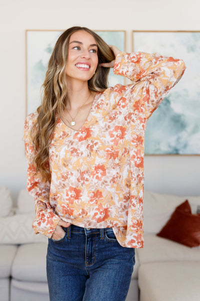 Get ready to make all your flowery dreams come true with our Marigold Dreams Floral Blouse