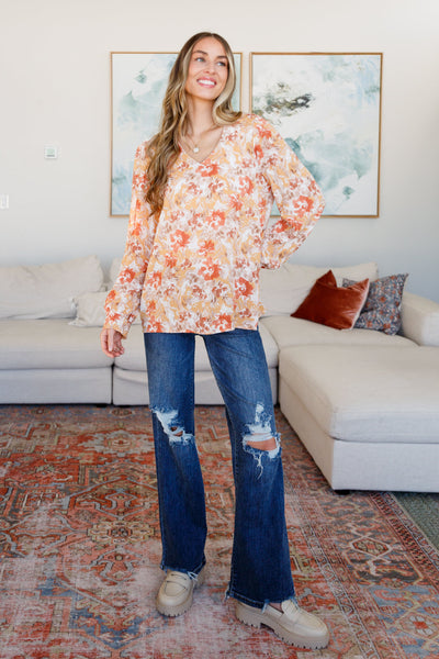 Get ready to make all your flowery dreams come true with our Marigold Dreams Floral Blouse