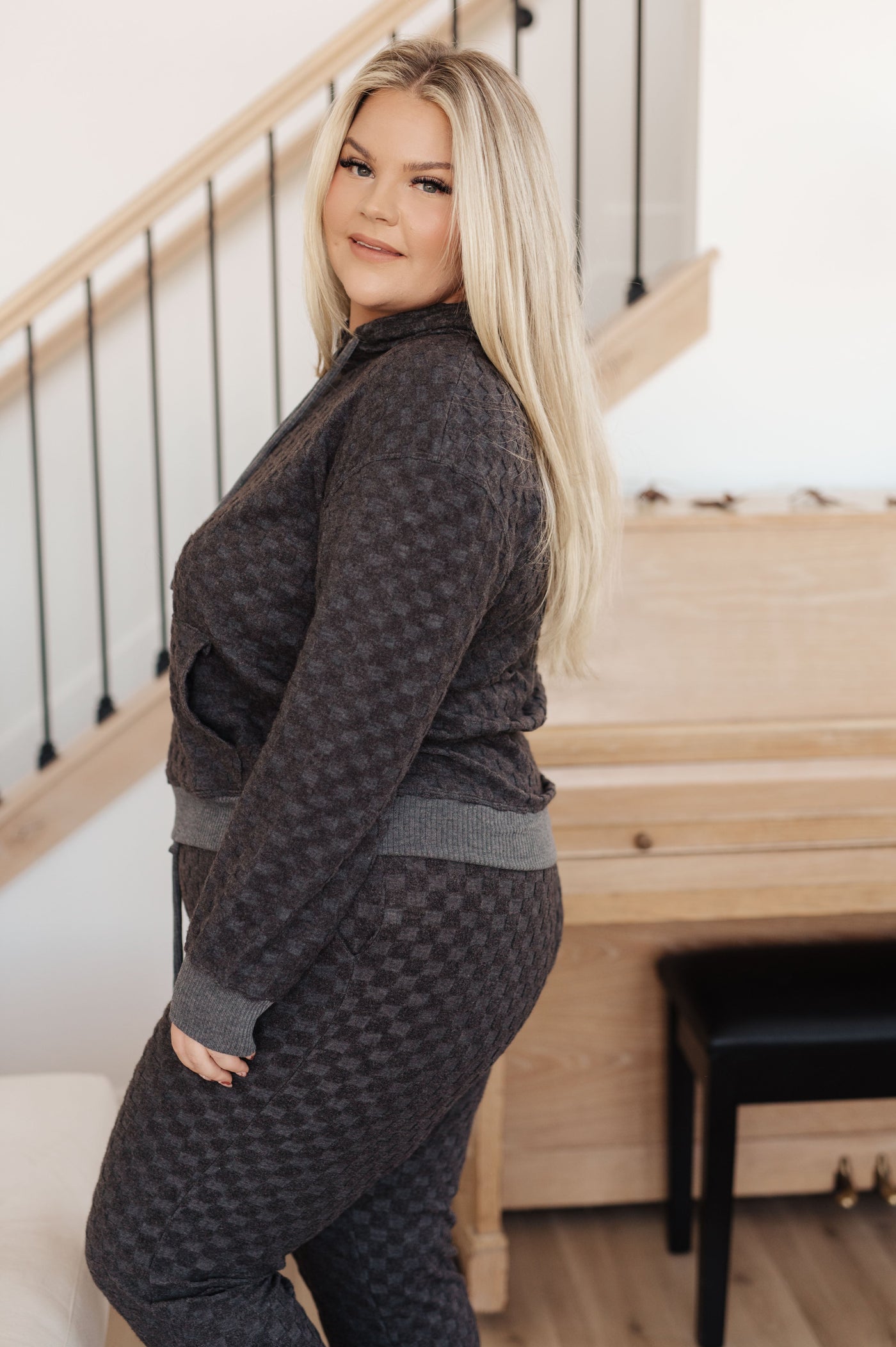 Look no further for the perfect weekend outfit—the Mic Check Checkered Lounge Set is here! Comfortable and stylish, this set features a checkered Hacci knit hooded sweatshirt 
