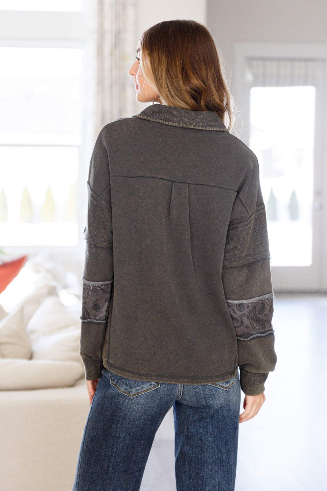 Made from soft French Terry fabric and featuring a trendy collared V-neck, this warm and easy-to-style pullover will quickly become a staple in your closet.