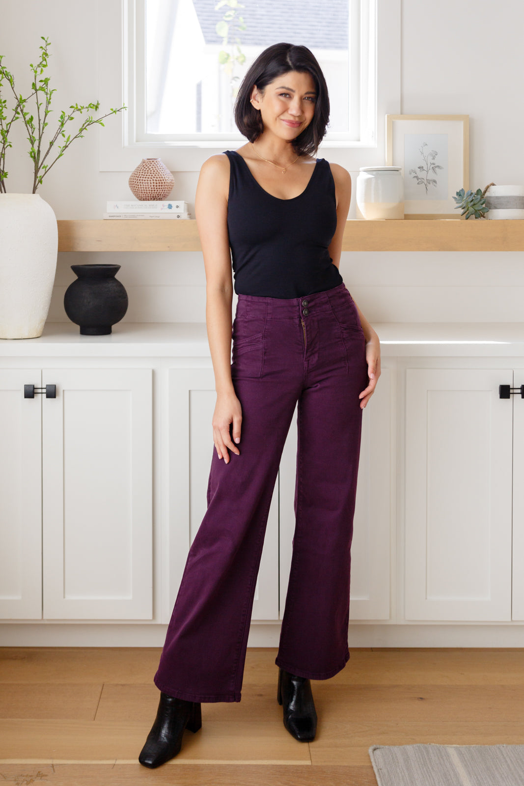 Treat yourself to a timeless style with our Petunia High Rise Wide Leg Jeans. Comfort meets sophistication in this modern design, featuring a tailored waistband, welted pockets, double button waistband, and contour seaming for an ultra-flattering fit