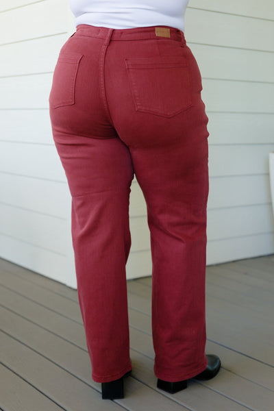 Introducing our Phoebe High Rise Jeans from Judy Blue, designed with a flattering center front seam and a comfortable, straight-leg silhouette. Featured in a rich burgundy, each piece is garment-dyed for a uniquely personal touch