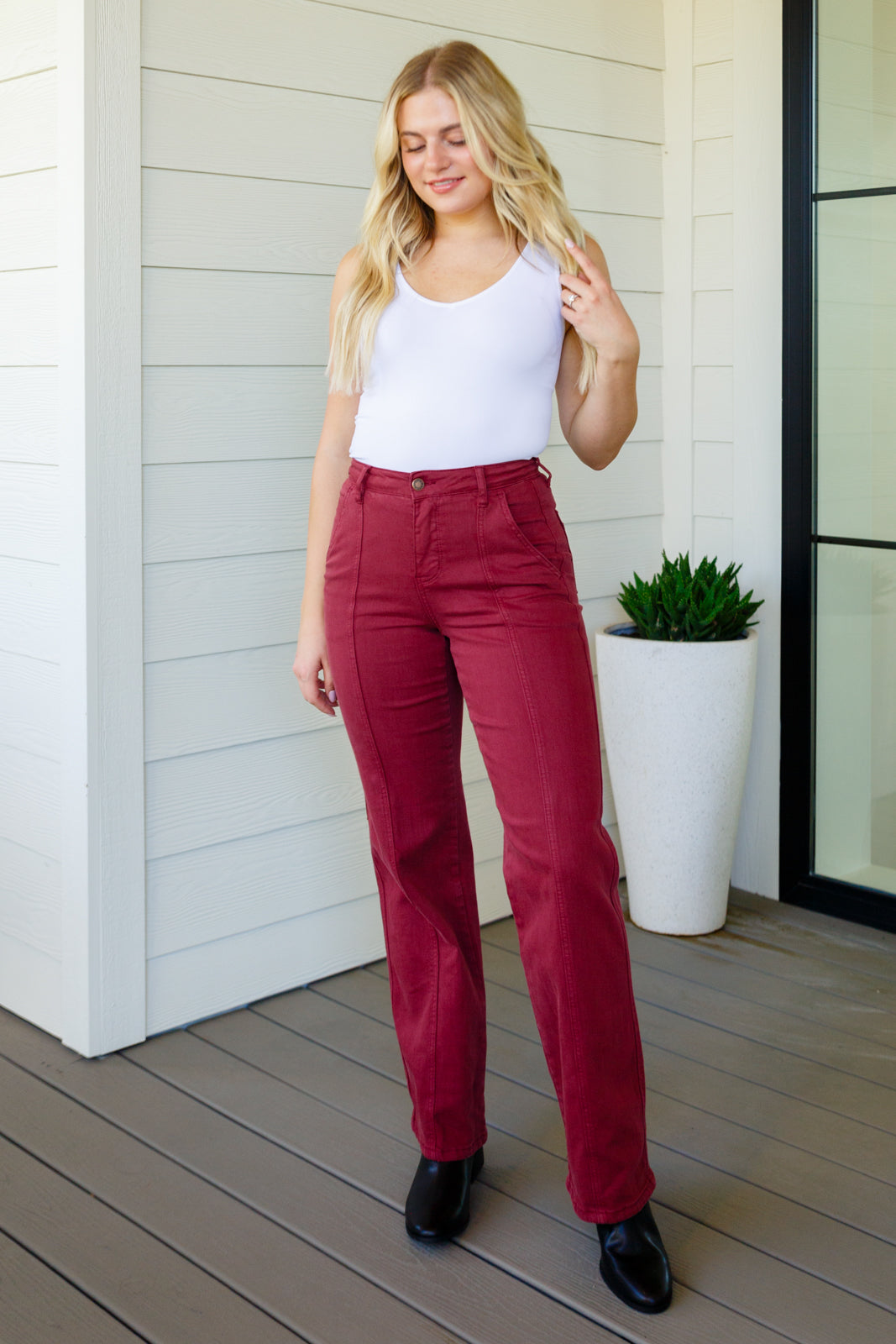 Introducing our Phoebe High Rise Jeans from Judy Blue, designed with a flattering center front seam and a comfortable, straight-leg silhouette. Featured in a rich burgundy, each piece is garment-dyed for a uniquely personal touch