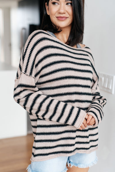 Stay cozy and confident in our Self Assured Striped Sweater. Crafted with a mid-weight knit for warmth and comfort