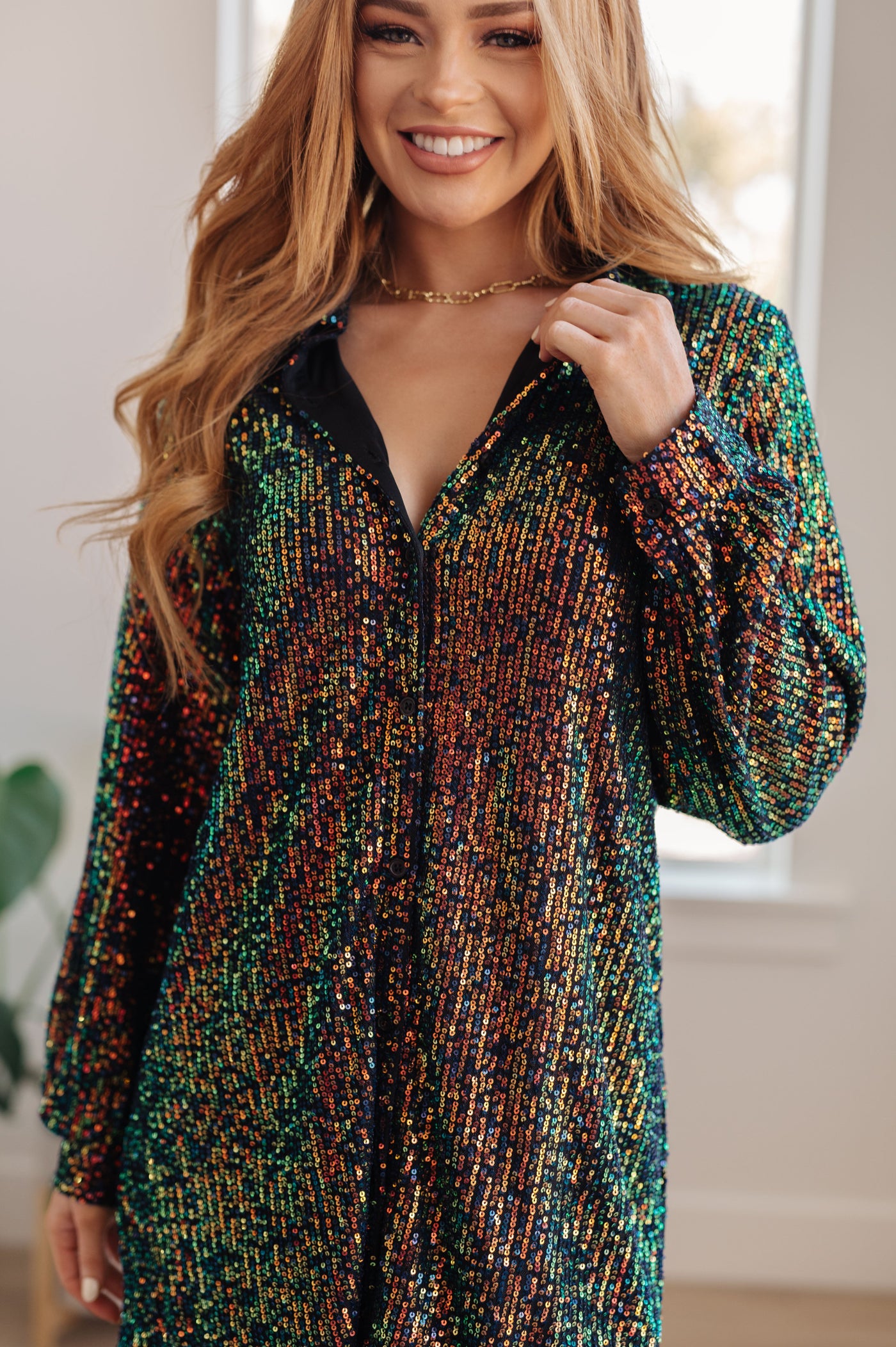 This Shimmering Splendor Sequin Shirt Dress is the perfect statement piece for any occasion