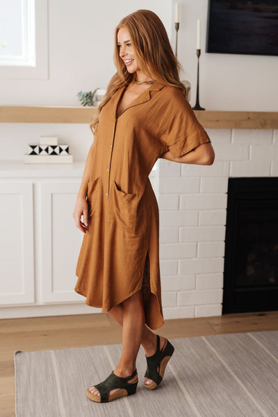 This Sure to Be Great Shirt Dress is the epitome of chic! Its linen blend and collared neckline create a timeless look, while the twisted cutout back waist detail adds a modern twist