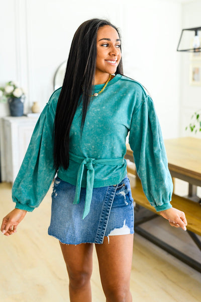 Business in the front, party in the back! The Tied Up In Cuteness Mineral Wash Sweater In Teal features a mineral wash french terry fabric that shapes a crew neckline with pleated balloon sleeves and slightly cropped fit