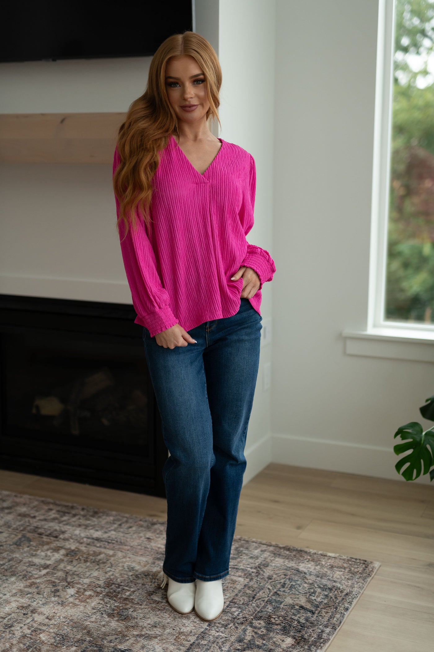 This Very Refined V-Neck Blouse is an effortless look to take you through the season. Crafted from textured fabric, it features a pleated v-neckline, balloon sleeves and smocked elastic cuffs for an easy, comfortable fit.