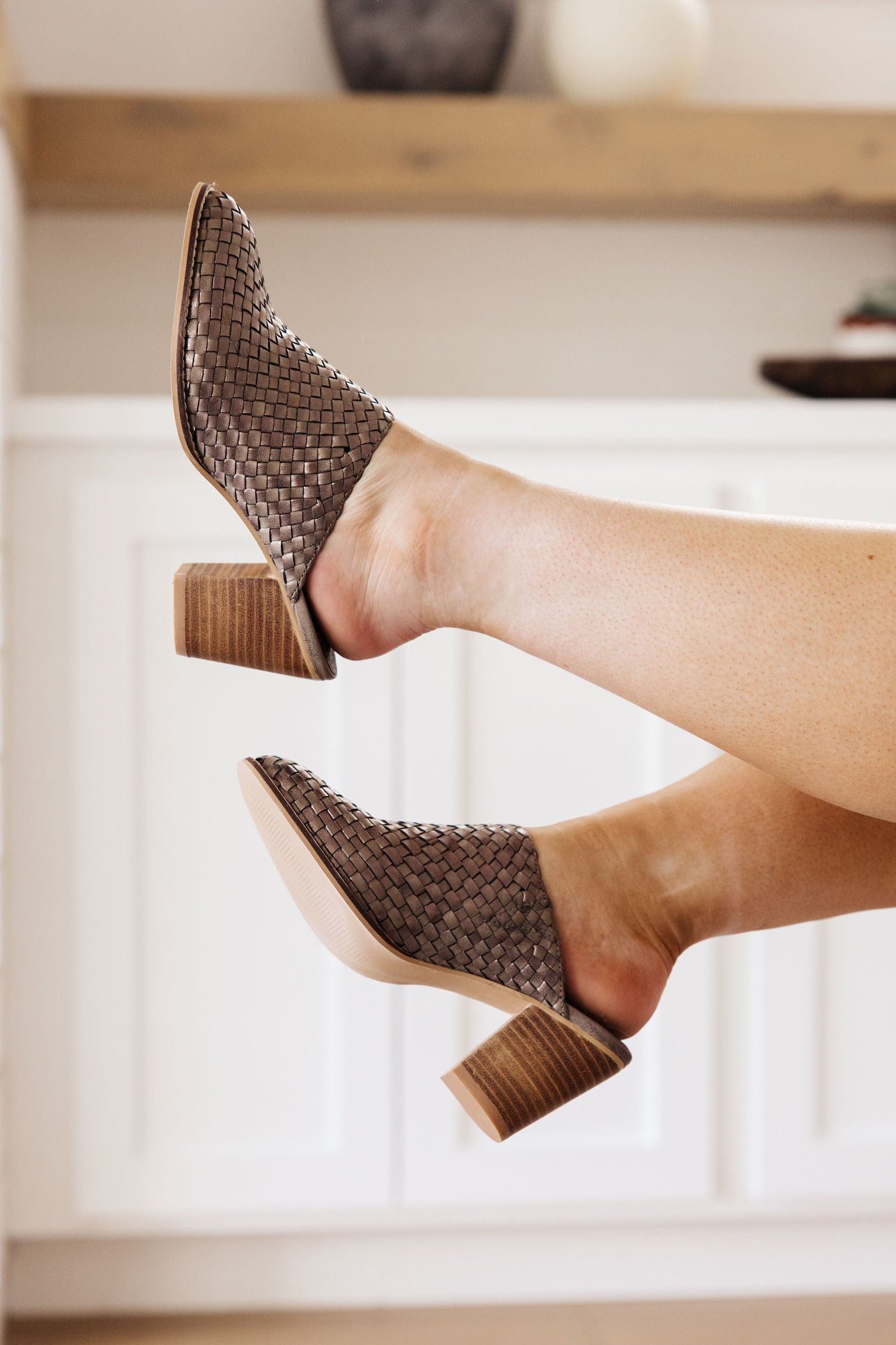 Take a walk with the Walk With Me Woven Mules! These beautiful bronze vegan leather mules will keep you comfortable with their cushioned footbed and EVA block heel for ultimate shock absorption
