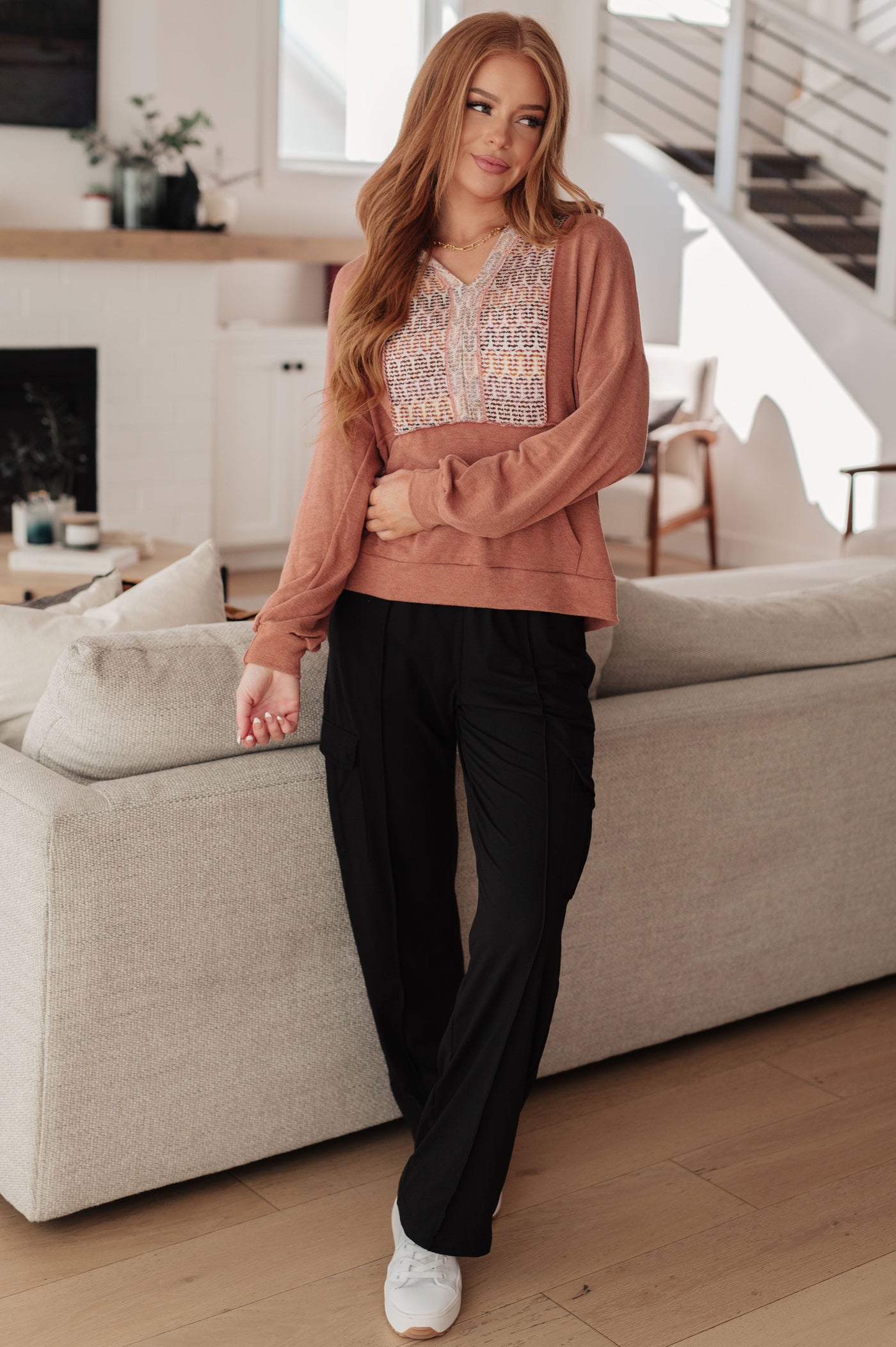 This Wave Hello Hoodie is ideal for any occasion. Crafted in a soft jersey knit with a hooded V-Neckline, kangaroo pocket, and a unique multicolored textured panel, it's sure to become your go-to piece