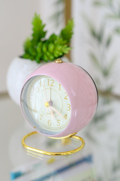 Add a touch of whimsy to your workspace with the Wonderland Desk Clock