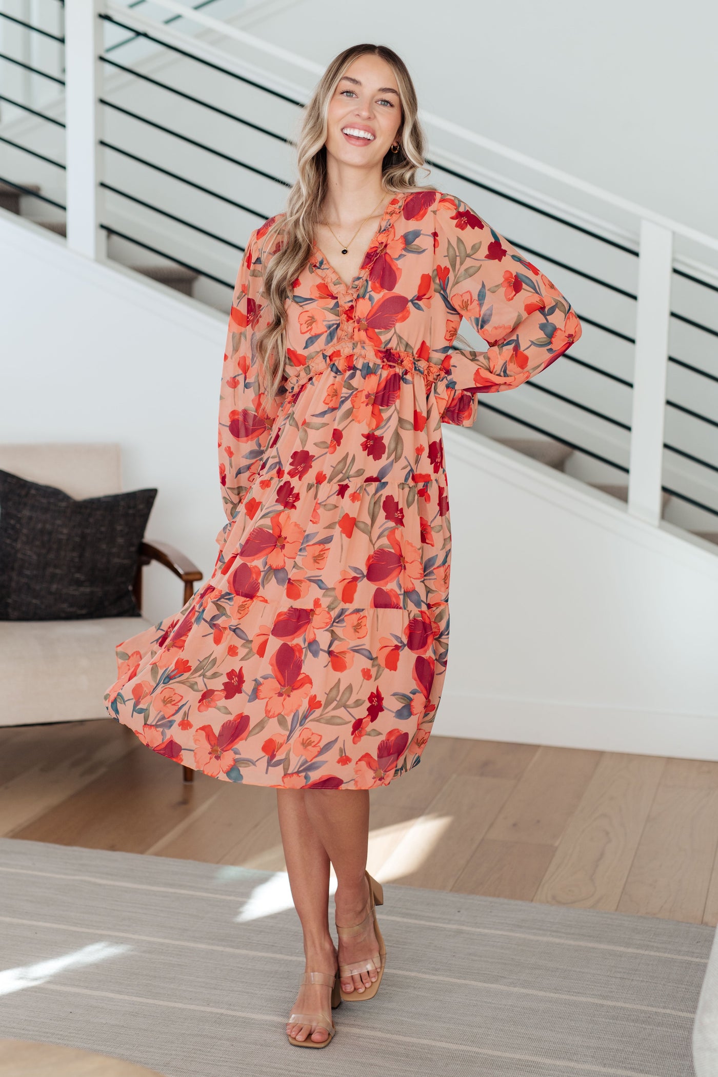 Look oh-so-chic in the You And Me Floral Dress! Featuring a flattering ruffled v-neckline, long sleeves, and a gorgeous floral print chiffon, this dress will make you feel beautiful in every way