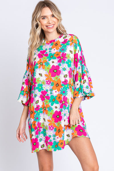 The Floral Round Neck Lantern Sleeve Mini Dress is a charming and stylish choice for a feminine and romantic look