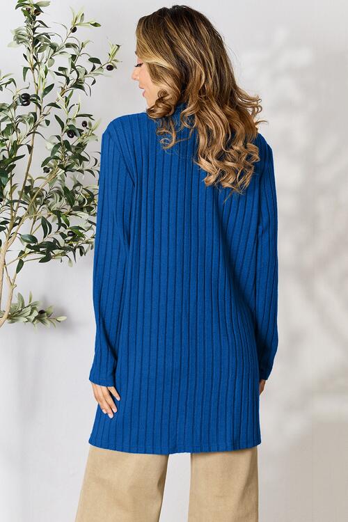 This Ribbed Open Front Cardigan with Pockets is perfect for any occasion. It features ribbed fabric with an open front and two side pockets for easy storage