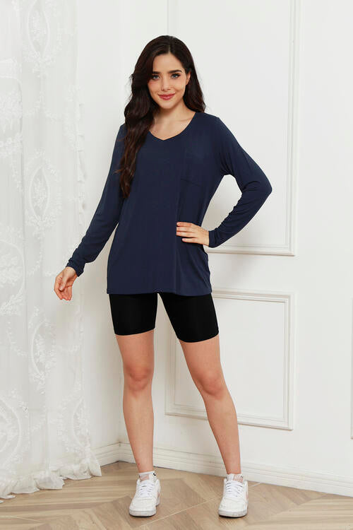 This Basic Bae V-Neck Long Sleeve Top offers a full size fit and optimum comfort for all day wear. Made of soft, lightweight material, this top provides a stylish look with plenty of breathability to keep you cool.